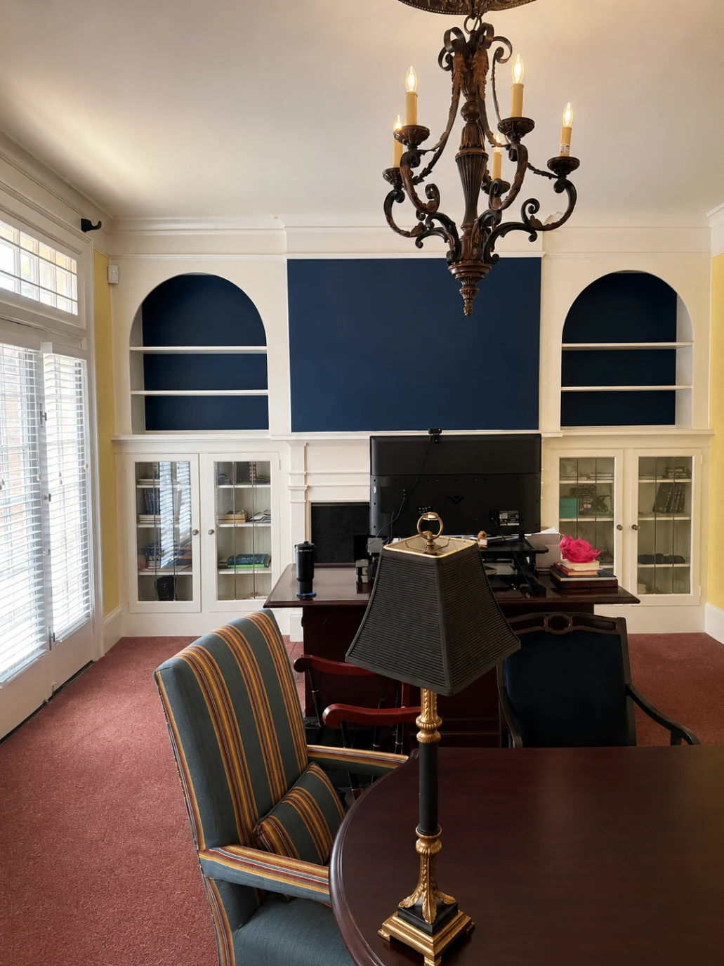 Completed navy feature wall and built-in shelving renovation